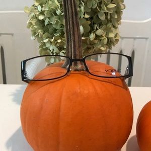 Vogue eyewear, “ high fashion” glasses.